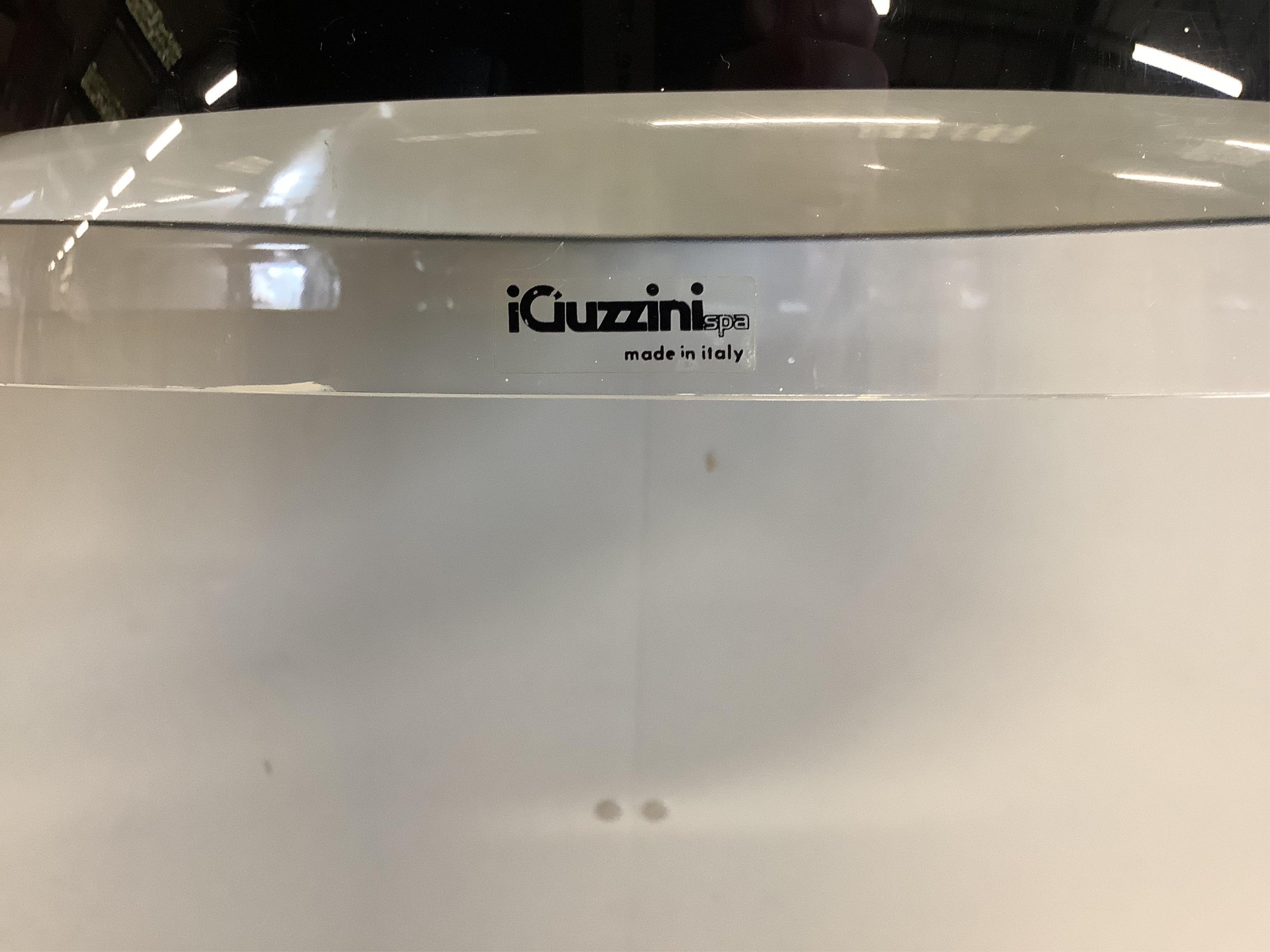 A perspex ceiling lamp by Guzzini, diameter 45cm, height 27cm